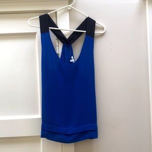 Naked Zebra Blue sleeveless top with black straps. Size S